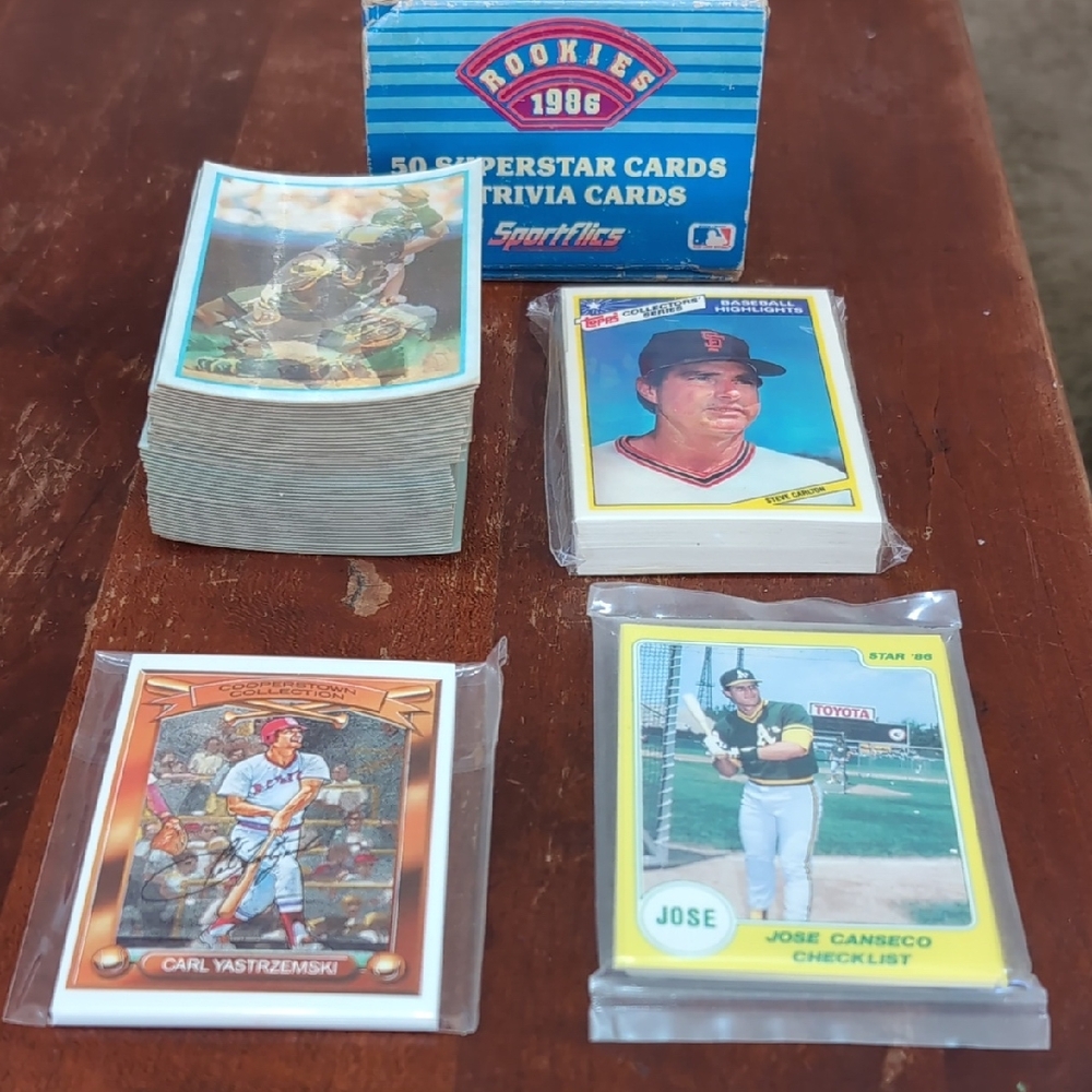 4 baseball sets 1986 Sportsflics & Highlights 1986 Star canseco 1989 cooperstown